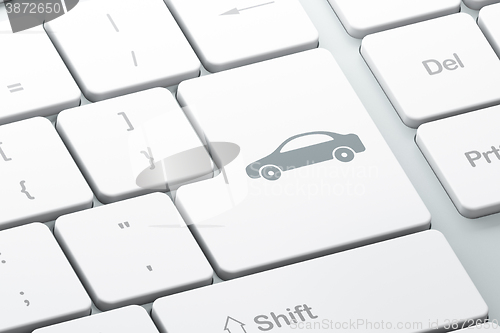 Image of Tourism concept: Car on computer keyboard background