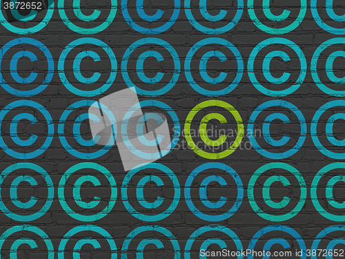 Image of Law concept: copyright icon on wall background
