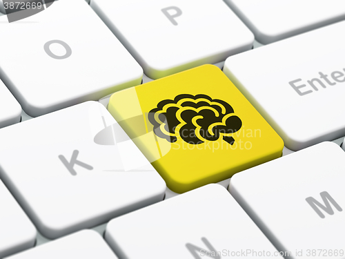 Image of Science concept: Brain on computer keyboard background