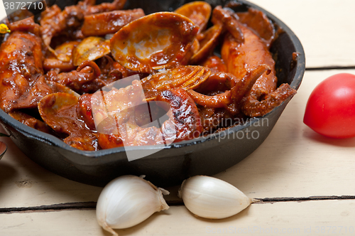 Image of fresh seafoos stew on an iron skillet