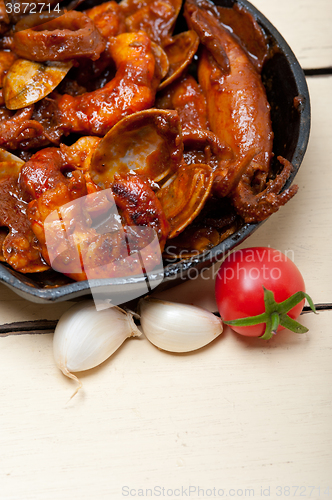 Image of fresh seafoos stew on an iron skillet