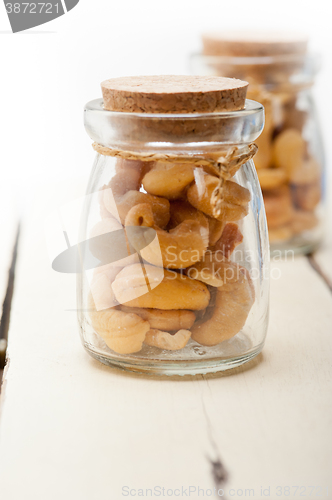 Image of cashew nuts on a glass jar 