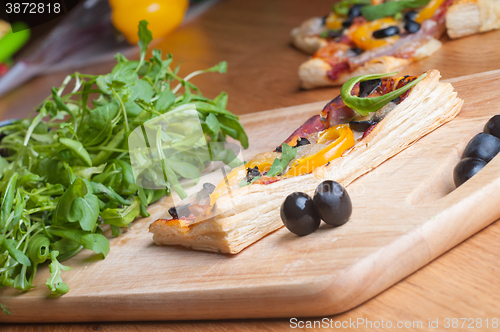 Image of Puff pastry cake on the wooden board