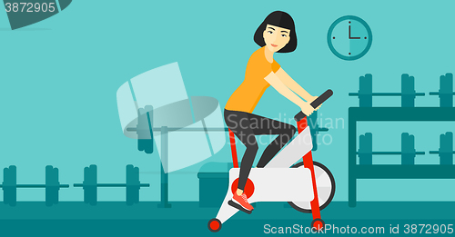 Image of Woman doing cycling exercise.