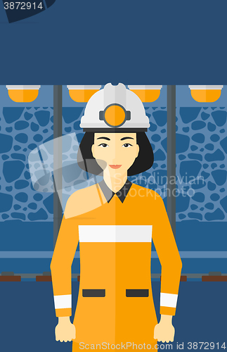 Image of Confident miner in hardhat.