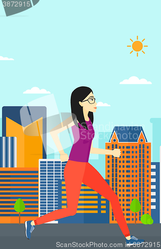 Image of Sportive woman jogging.