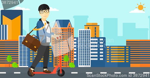 Image of Man riding on scooter.