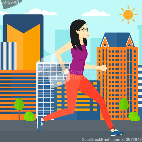 Image of Sportive woman jogging.