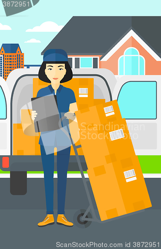 Image of Woman delivering boxes.