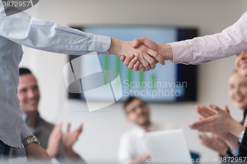 Image of business womans handshake