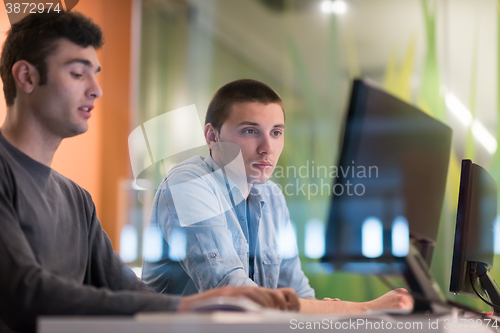 Image of technology students group working  in computer lab school  class