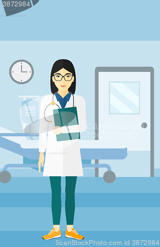 Image of Doctor in hospital ward.