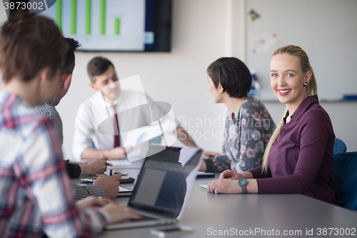 Image of young business people group on meeting at office