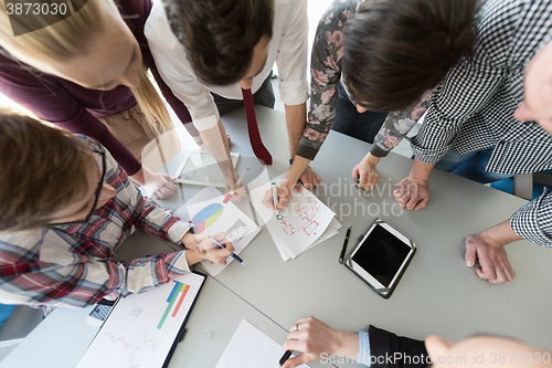 Image of top  view of business people group brainstorming on meeting