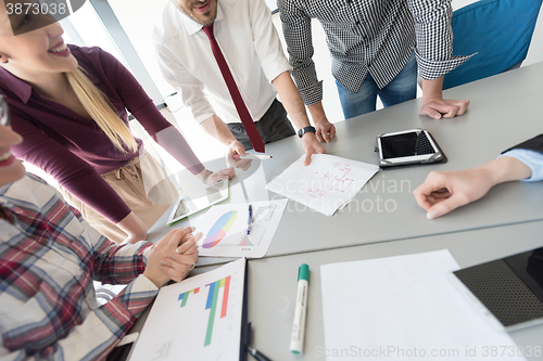 Image of top  view of business people group brainstorming on meeting