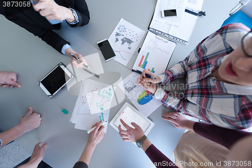 Image of top  view of business people group brainstorming on meeting