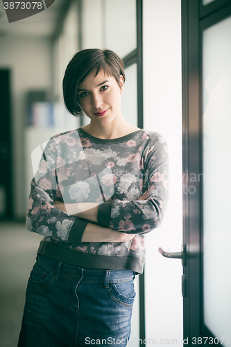 Image of portrait of business woman in casual clothes at startup office