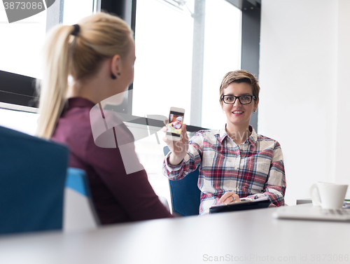 Image of portrait of young business woman at modern office