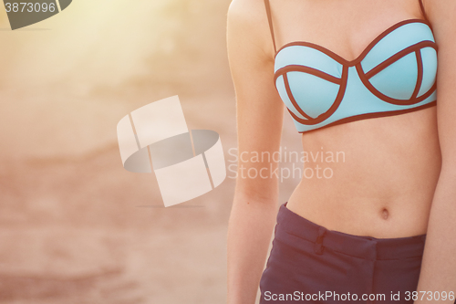 Image of young woman in swimsuit