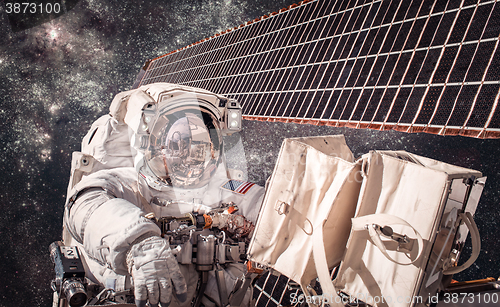 Image of International Space Station and astronaut.