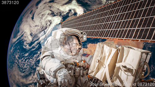 Image of International Space Station and astronaut.