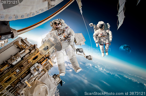 Image of International Space Station and astronaut.