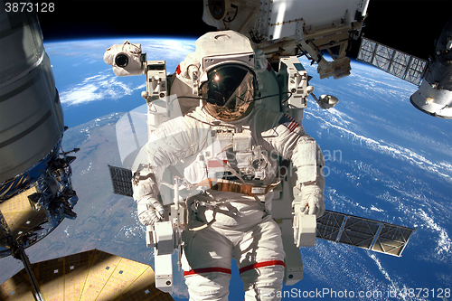 Image of International Space Station and astronaut.