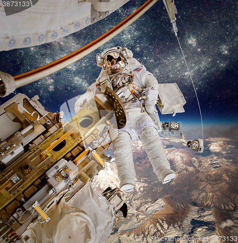 Image of International Space Station and astronaut.