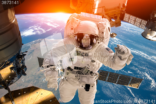 Image of International Space Station and astronaut.