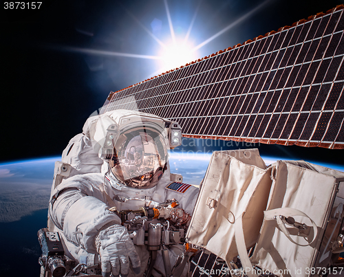 Image of International Space Station and astronaut.