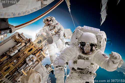 Image of International Space Station and astronaut.