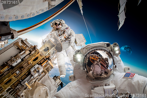 Image of International Space Station and astronaut.