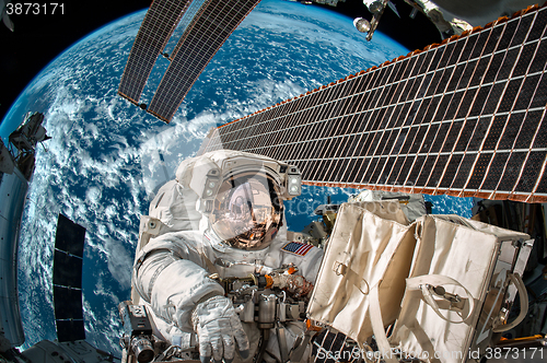 Image of International Space Station and astronaut.