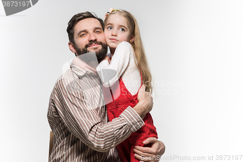Image of Girl hugging her father  over a white background