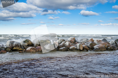 Image of Sea waves breaking on the rocks