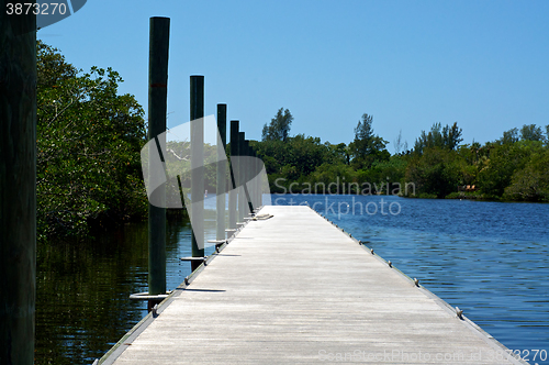 Image of long pier on river in florida