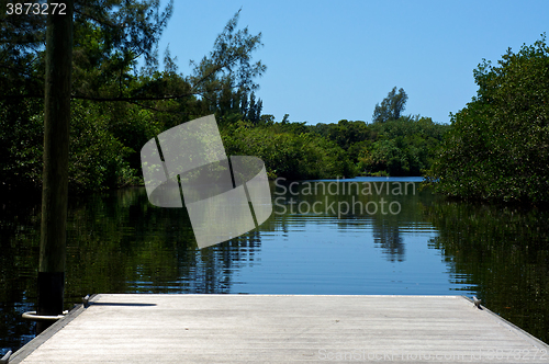 Image of short pier on river in florida