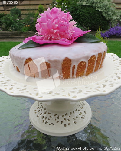 Image of Cake with glazing and Peony