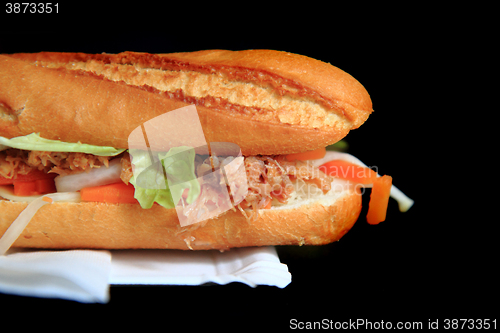 Image of baguette on the black background