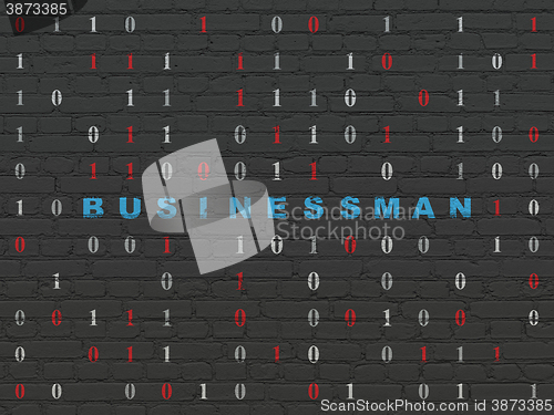 Image of Business concept: Businessman on wall background