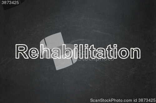 Image of Medicine concept: Rehabilitation on chalkboard background