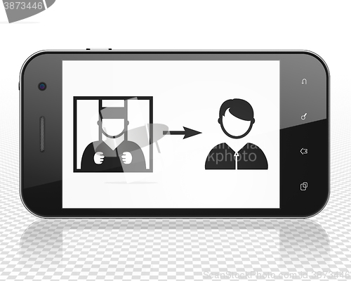 Image of Law concept: Smartphone with Criminal Freed on display