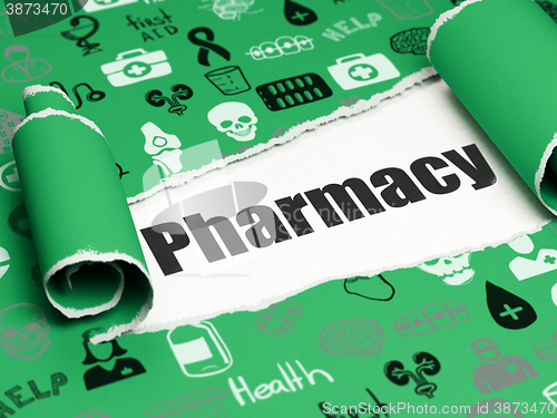 Image of Healthcare concept: black text Pharmacy under the piece of  torn paper