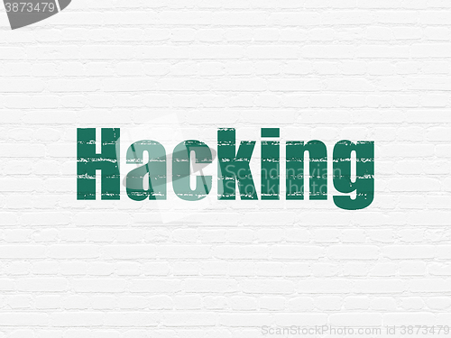 Image of Privacy concept: Hacking on wall background