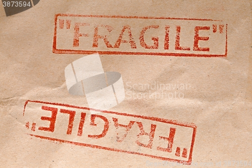 Image of Fragile stamp closeup