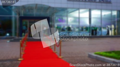 Image of red carpet with the sides, blurred background