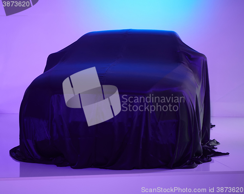 Image of car presentation on a concrete room