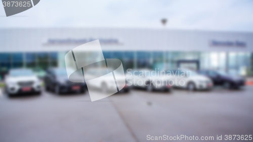 Image of Abstract blurred photo of motor show, car show room,