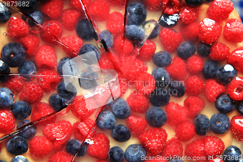 Image of raspberries and blueberries cake