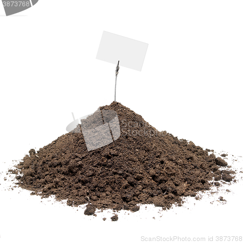 Image of Pile of soil with message